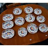 11 VARIOUS IRON STONE FLORAL DECORATED PLATES