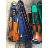 2 VIOLIN CASES AND 4 BOWS