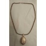 A VICTORIAN STYLE SIL OVAL HINGED LOCKET ON SIL NECK CHAIN 18'' LONG