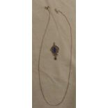 A SIL & LAPIS PENDANT WITH A CHAIN