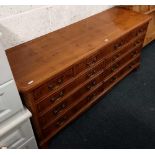 YEW SIDEBOARD WITH 9 DRAWERS & BRASS DROP HANDLES, 5ft LONG