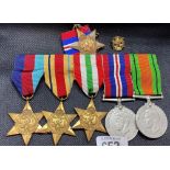 A MEDAL BAR WITH 39, 45 STAR, AFRICA STAR & ITALY STAR & WAR MEDALS PLUS AN ATLANTIC STAR