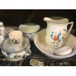 SHELF OF CHINAWARE INCL; CHAMBER POTS, JUG & BASIN WASH SET & OTHER CHINAWARE