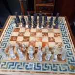 SMALL BUT HEAVY SQUARE TABLE WITH PILLAR LEGS IN THE FORM OF A CHESS BOARD & DRAWER WITH CHESS