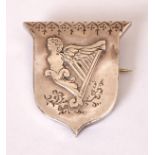 Circa 1880 silver Nationalist badge. Mermaid or Maid of Erin Harp motif on decorated shield, pin