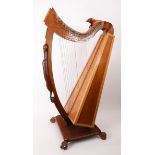 1970s large harp made by Liam Coyle, IRA prisoner. A large playable harp, on a wheeled base, made in