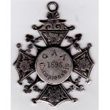 1895 G.A.A. All-Ireland Senior Hurling Championship Final runners-up medal to Kilkenny. Sterling