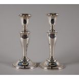 Irish silver pair of candlesticks. By Irish Silver Ltd, hallmarked Dublin for 1980. 7 inches high.