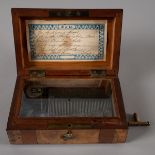 19th century music box playing Irish and Scottish tunes. Attractive small inlaid music box, with 3