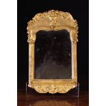 A Small 18th Century Giltwood Wall Mirror.