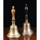 Two 19th Century Hand Bells on turned baluster handles with acorn finials,