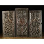 Three Carved Panels: A pair of chestnut panels with arched niches filled with swirling Gothic