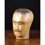 A Vintage Carved Wooden Mannequin Head with painted moustache & details, 24 cm in height (9½").