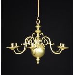 A 19th Century Brass Six Branch Chandelier in the 18th century style.