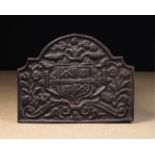 A 17th Century Cast Iron Fireback dated 1631.