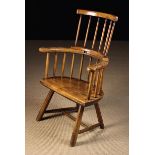 A Fine 18th Century Primitive Welsh Ash Comb-back Windsor Armchair.