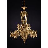 A Splendid 21 Light Gilt Bronze Chandelier in the Louis XV Style.