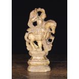 An 18th Century Alabaster Carving of Saint George & The Dragon,