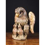 An 18th Century Wood Carving: Pelican in Her Piety piercing her chest to feed her chicks on the