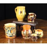 A Group of Six Decorative 19th Century French Country Jugs including three with marblised slipware