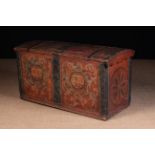 An 18th Century Scandinavian Dome-topped Painted Pine Marriage Chest.