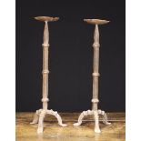 A Pair of Gothic Style Wrought Iron Candle-holders.