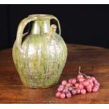 An 18th Century French Green-Glazed Pottery Oil Storage Jar from the Auvergne Region.