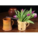 Two 19th Century French Pottery Jugs and a Lidded Jar.