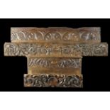 A Group of Carved Fragment Panels: Two Sections of 17th Century Oak Frieze Rails relief carved with