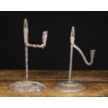 Two 17th/18th Century Style Wrought Iron Rushnips: One counterweighted by a conical sheet metal