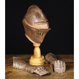 A 16th Century Style Close Helm & a Pair of Gauntlets;