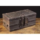 An Early 16th Century Iron Bound Oak Box of rectangular form with twin hasp lock and iron swing