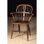 A Low Back Windsor Armchair having a yew-wood back hoop and bow.