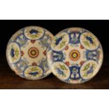 A Pair of 18th Century Delft Polychrome Plates, 22.5 cm in diameter (8¾").