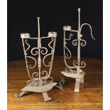 Two 17th Century Style Wrought Iron Candle/Torch Holders with sprung ring holders on scroll work