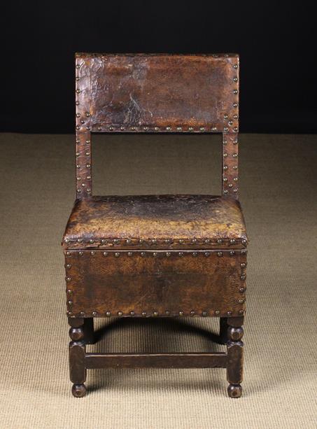 A Rare Cromwellian Leather Box-seated Chair.