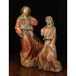Two 15th Century English Polychromed Wood Carvings: Angels depicted with curly shoulder length hair,