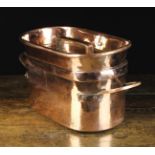 A Heavy Copper Twin-handled Stew Pan of oval form.