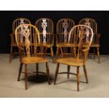 A Set of Six Yew-wood High Backed Windsor Armchairs by Melvin Tolley of Ashbourne,