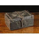A 15th Century French Cuir Bouilli Casket of rectangular form bound in iron straps with a swing