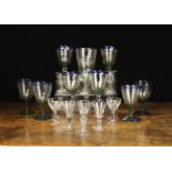 A Group of Glassware: Eight hand blown glass rummers with blue edged rims, approx 16.