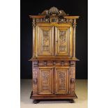 A 16th Century & Later French Renaissance Carved Walnut Corps-Deux Cabinet.