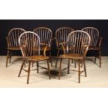 A Set of Six 19th Century Low Hoop back Windsor Armchairs.