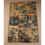 A Tapestry Wall Hanging composed of conjoined fragment panels of 17th verdure tapestry featuring a