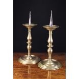 A Pair of 16th Century French Pricket Candlesticks with residual gilding.