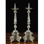 A Pair of 18th Century Repoussé White Sheet Metal Pricket Candlestick.