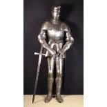 A 19th Century Copy of a 16th Century Full Suit of Armour embellished with etched panels of