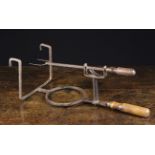 An 18th/Early 19th Century Wrought Iron Bar Gate Toaster with turned treen handles and a ringed