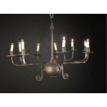 A 17th/Early 18th Century Iron Nine Branch Chandelier.