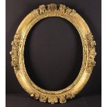An Attractive 17th/18th Cenutury Carved Giltwood Oval Picture Frame,